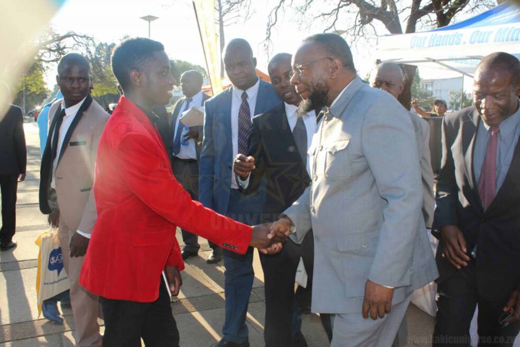 Honourable Minister Doctor Lazarus Dokora Chatting with Kudakwashe Maxwell